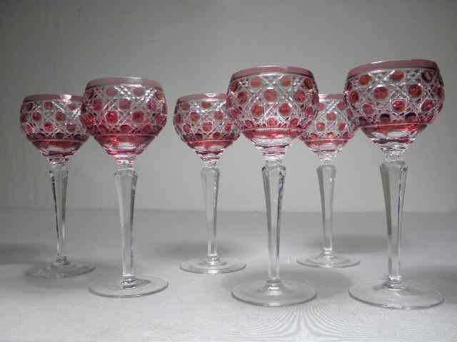 Appraisal: Six cranberry cut to clear crystal stems Geometric cut pattern