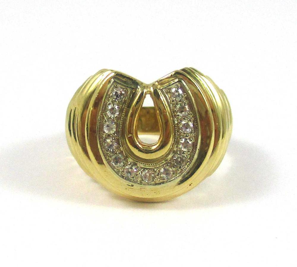 Appraisal: MEN'S DIAMOND AND FOURTEEN KARAT GOLD RING The top portion