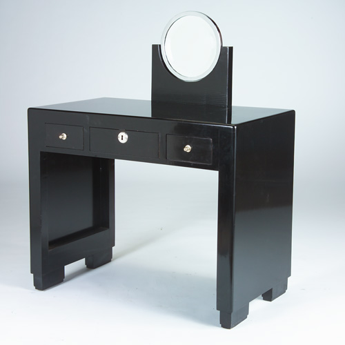 Appraisal: ART DECO Unusual black lacquered vanity with a circular beveled