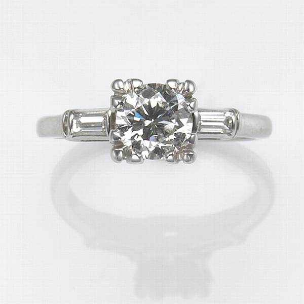 Appraisal: A platinum and diamond ring estimated total diamond weight ct