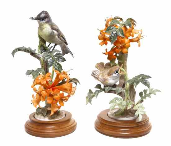 Appraisal: A Pair of Royal Worcester Dorothy Doughty Birds Phoebes perched