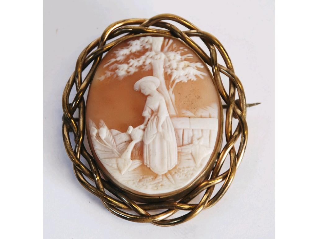 Appraisal: LATE NINETEENTH CENTURY SHELL CAMEO BROOCH carved with garden scene