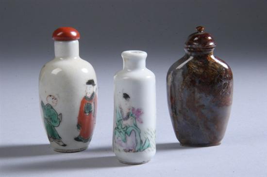 Appraisal: THREE CHINESE SNUFF BOTTLES One famille rose porcelain snuff bottle