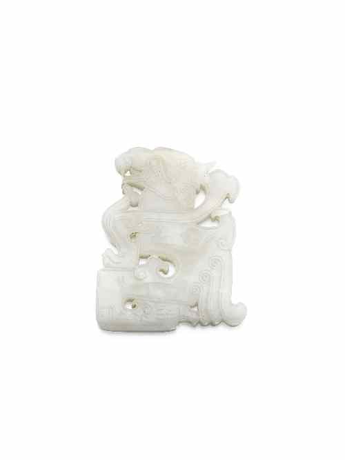 Appraisal: A Chinese white jade mythical bird pendant of flattened form