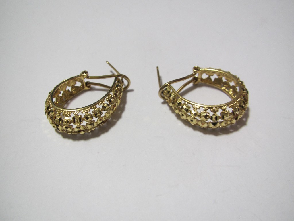 Appraisal: A pair of kt gold hoop earrings pierced diamond cut