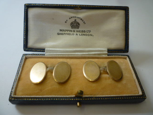 Appraisal: A PAIR OF CT GOLD CUFFLINKS of plain oval form