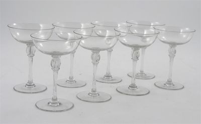 Appraisal: A set of eight Holmegaards clear glass champagne bowls designed