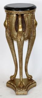 Appraisal: Gilt pedestal with crane supports marble top Gilt pedestal supported