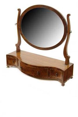 Appraisal: A mahogany and inlaid swing frame toilet mirror the oval