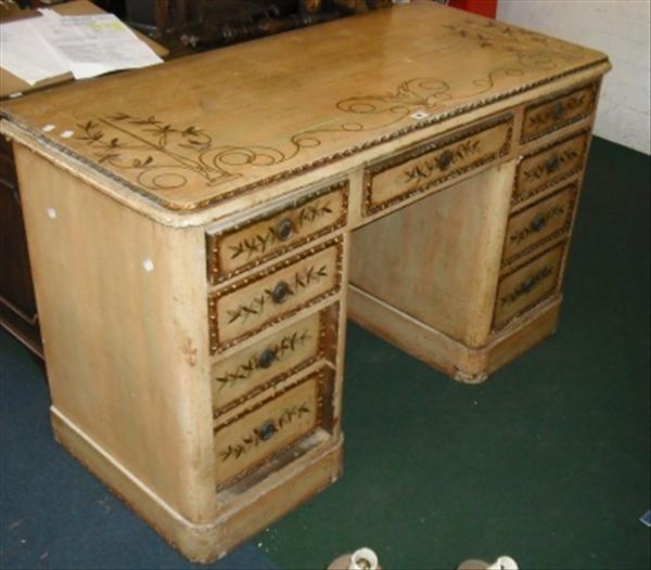 Appraisal: A cream and gilt painted twin pedestal desk