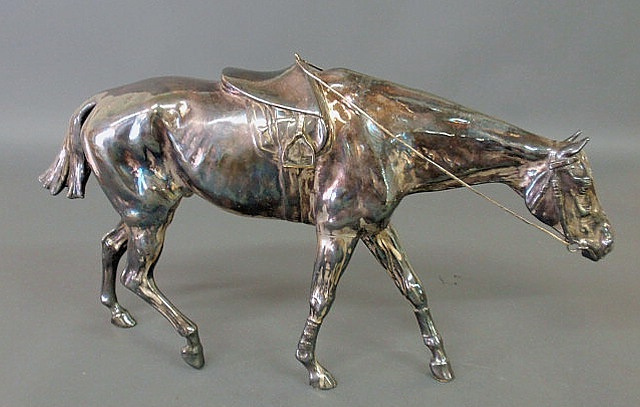 Appraisal: Silver plated statue of a racehorse hollow body h x