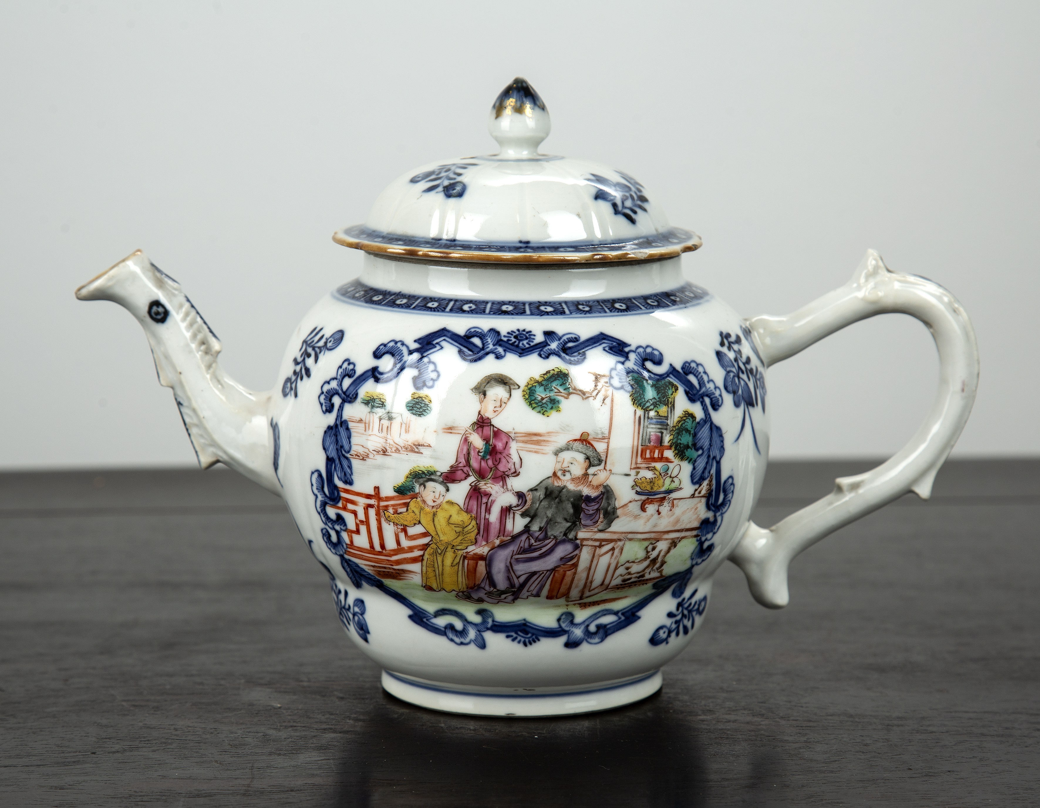 Appraisal: Mandarin porcelain teapotChinese th Century painted with blue framed panels