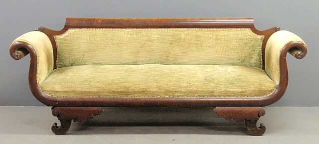 Appraisal: - Classical form mahogany sofa with rolled arm supports c