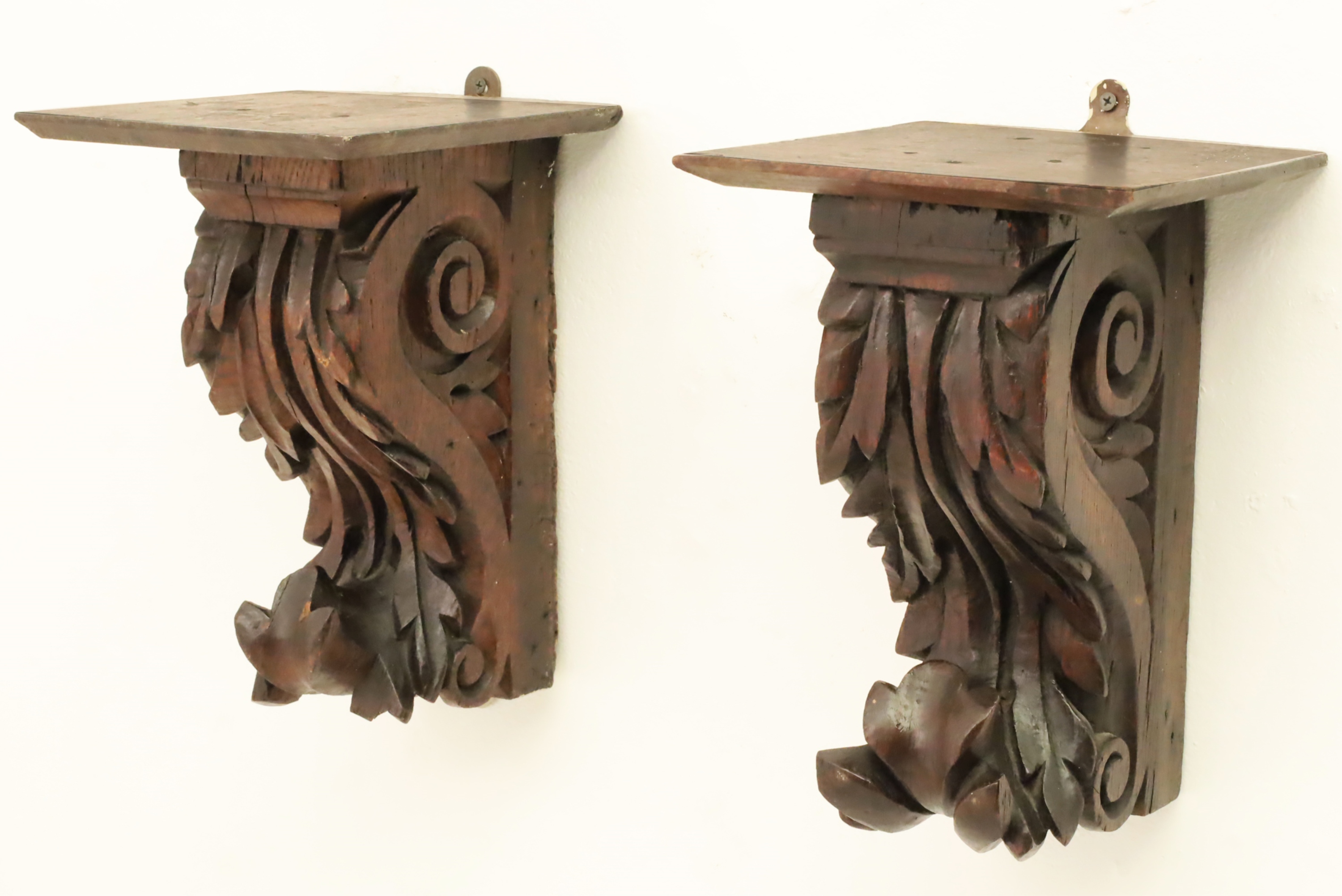 Appraisal: PAIR OF ENGLISH OAK CORBELS Now mounted as shelves scrolling