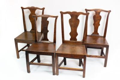 Appraisal: Four fruitwood and elm splat back single chairs with solid