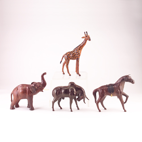 Appraisal: Four modern leather-covered animals including a horse elephant giraffe and