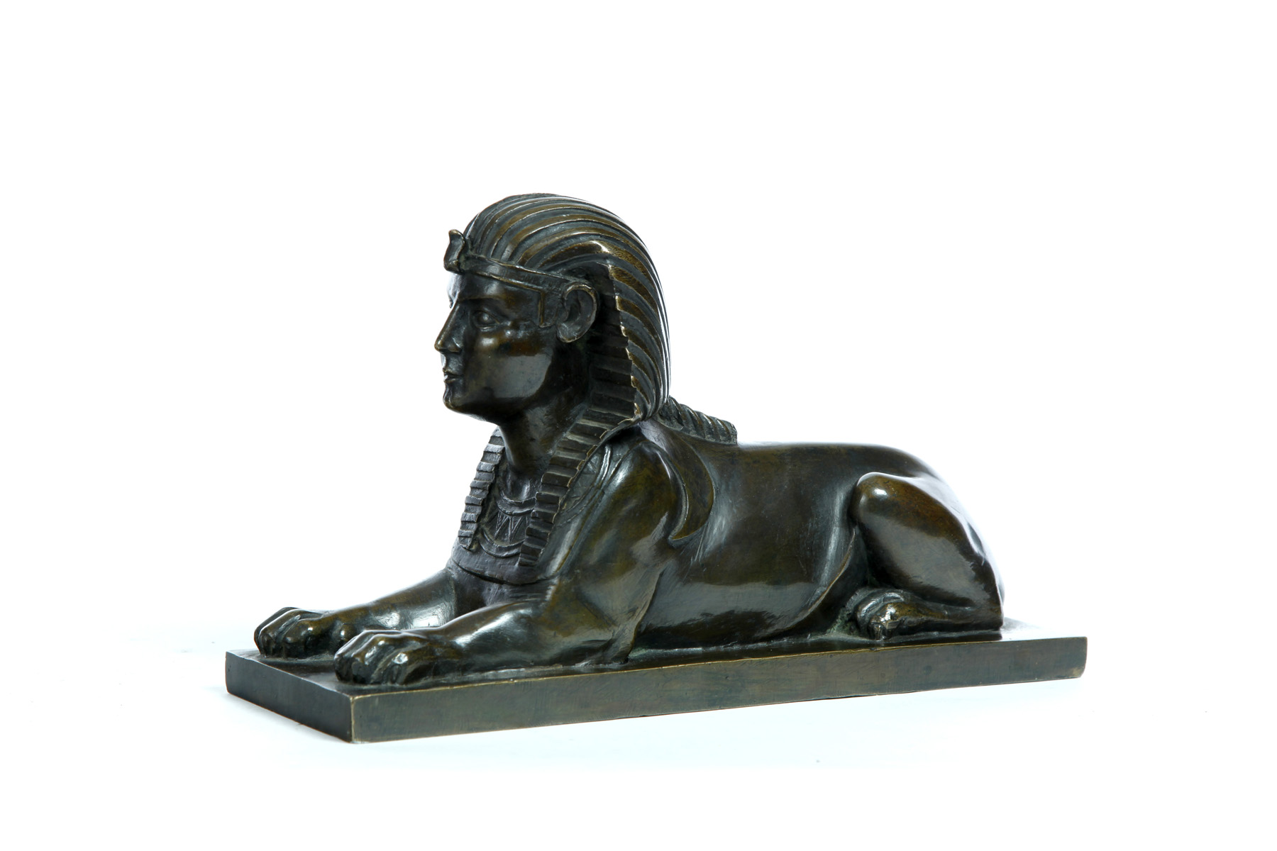 Appraisal: BRONZE SPHINX Probably European late th century Reclining sphinx most