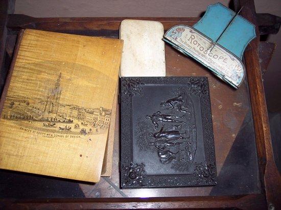 Appraisal: A Mauchline ware photograph album and contents modelled as a