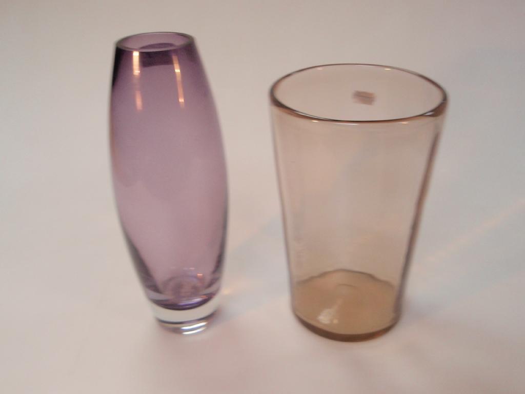 Appraisal: An amethyst Polish studio vase and another