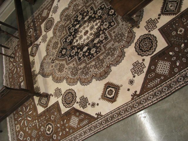 Appraisal: ' x Tabriz Oriental rug with cream field and brown