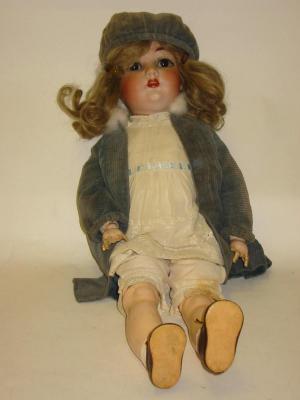 Appraisal: A Franz Schmidt Co bisque head girl doll with brown