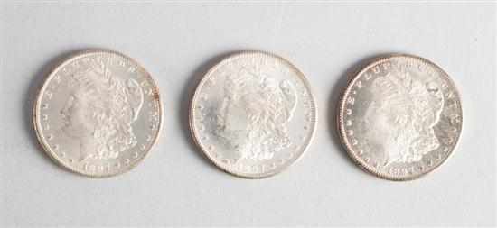 Appraisal: Three United States Morgan silver dollars S MS- Estimate -