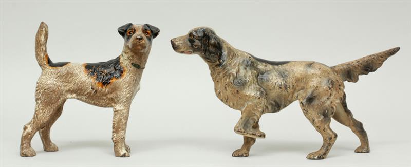 Appraisal: Two Painted Cast-Iron Dog-Form Doorstops Comprising a setter in and