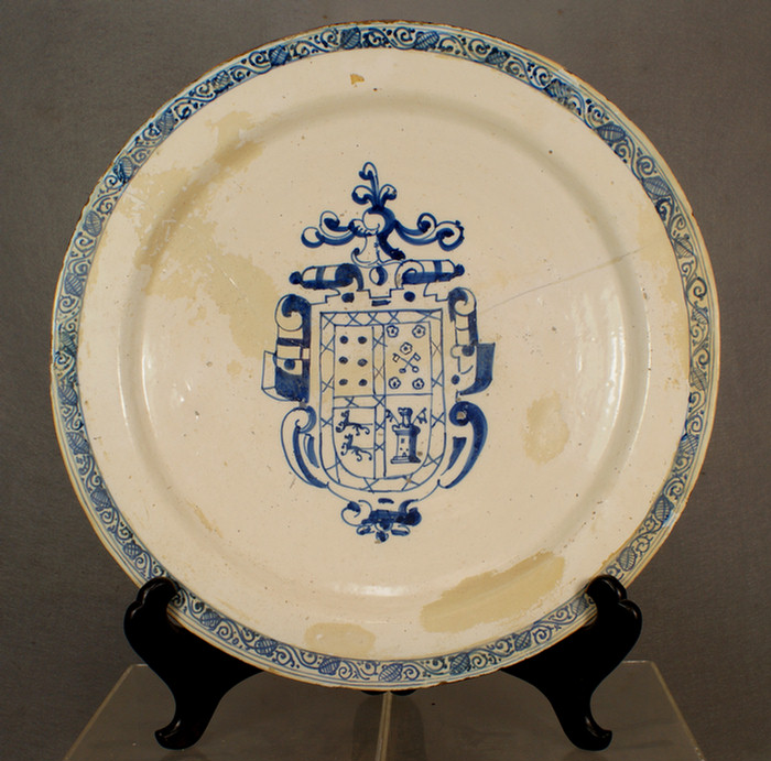 Appraisal: Large armorial Faience or Delft charger Continental d broken in