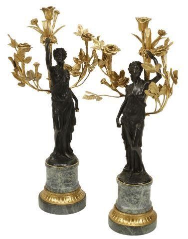 Appraisal: pair French bronze dore et patine three-light candelabra each modeled