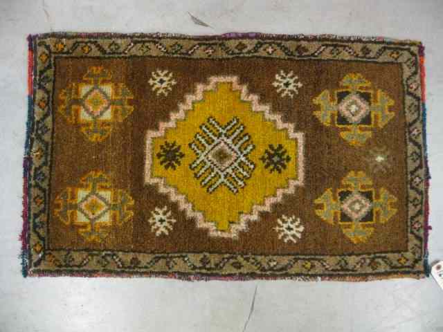 Appraisal: Turkish Handmade Mat earthtones ' '' x ' ''