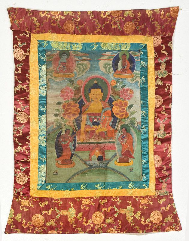 Appraisal: Painted Tibetan Thanka th century with multiple embroidered silk borders