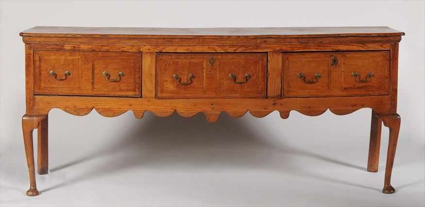 Appraisal: VICTORIAN OAK WELSH DRESSER BASE The solid top above a