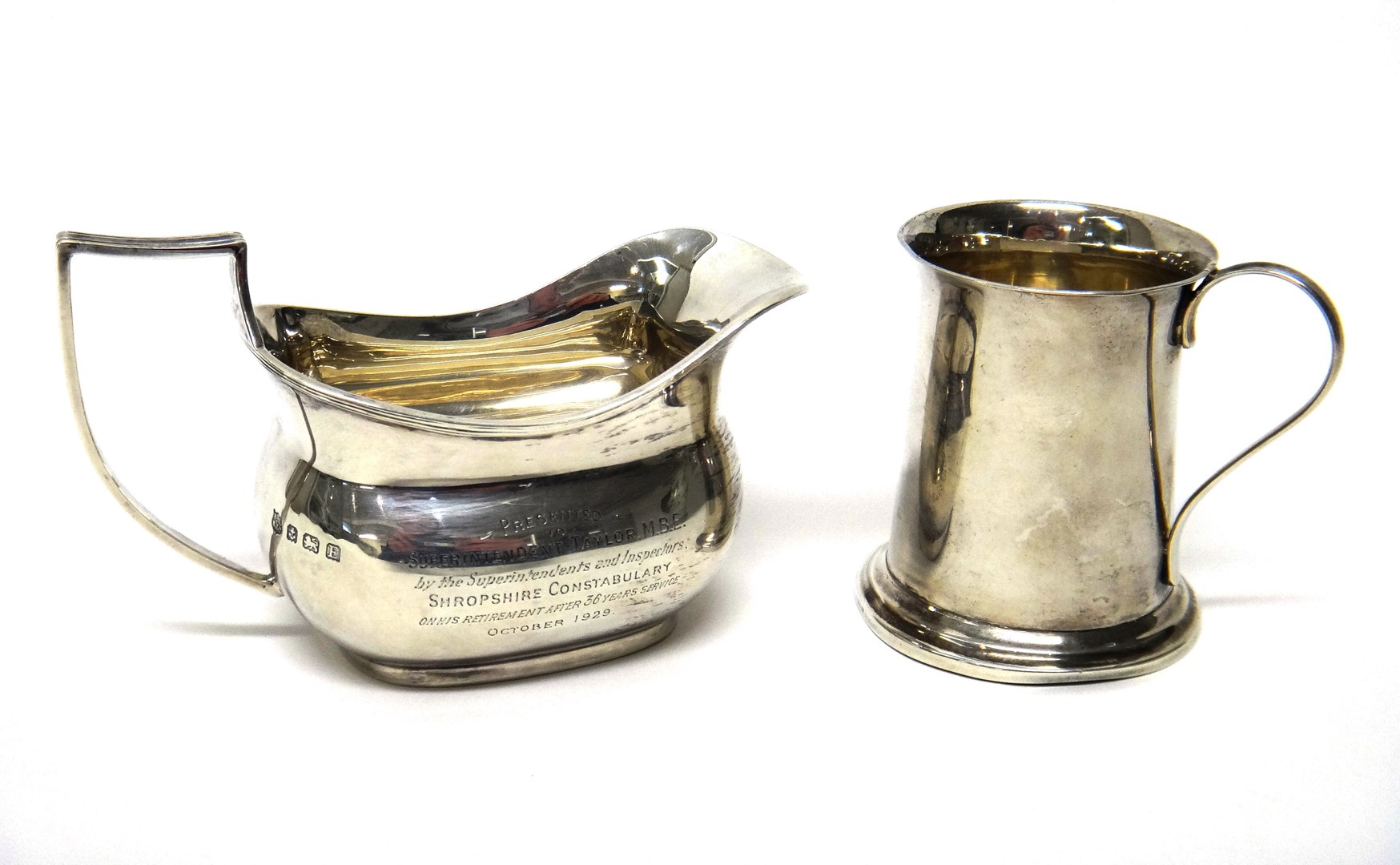 Appraisal: Silver comprising a milk jug of boat shaped form presentation