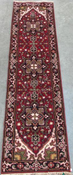 Appraisal: Handmade Oriental Runner Heriz design burgundy with cream and sage