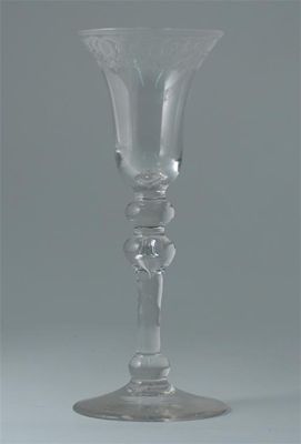 Appraisal: A wine glass the bell-shaped bowl engraved with a band