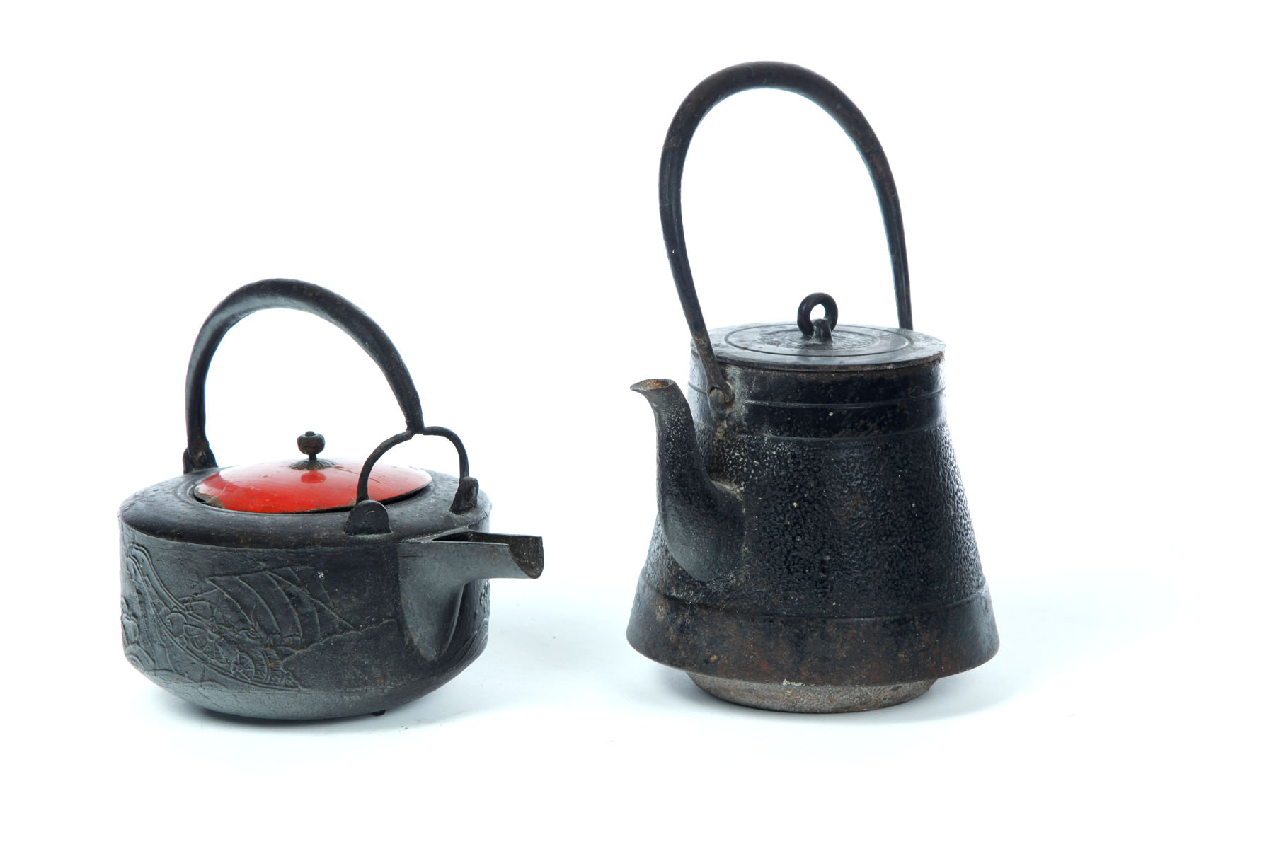 Appraisal: IRON SAKE KETTLE AND TEAPOT Japan th century Tall teapot