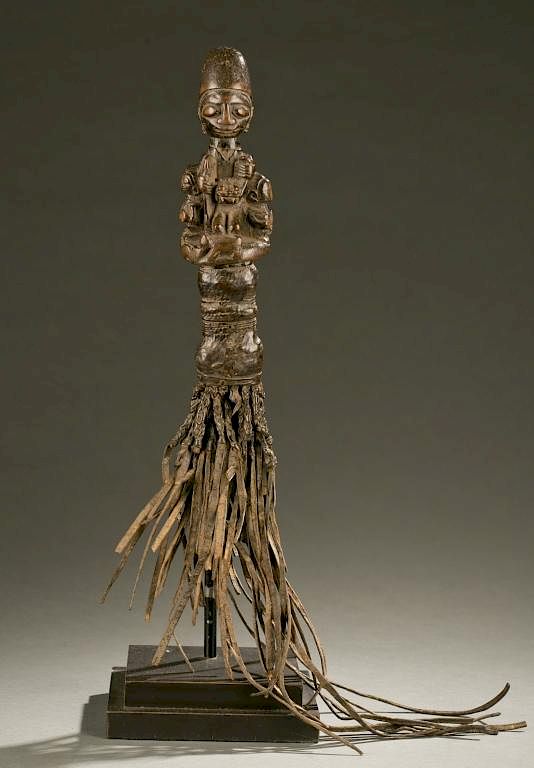 Appraisal: Yoruba flywhisk with equestrian figure A flywhisk with carved wood