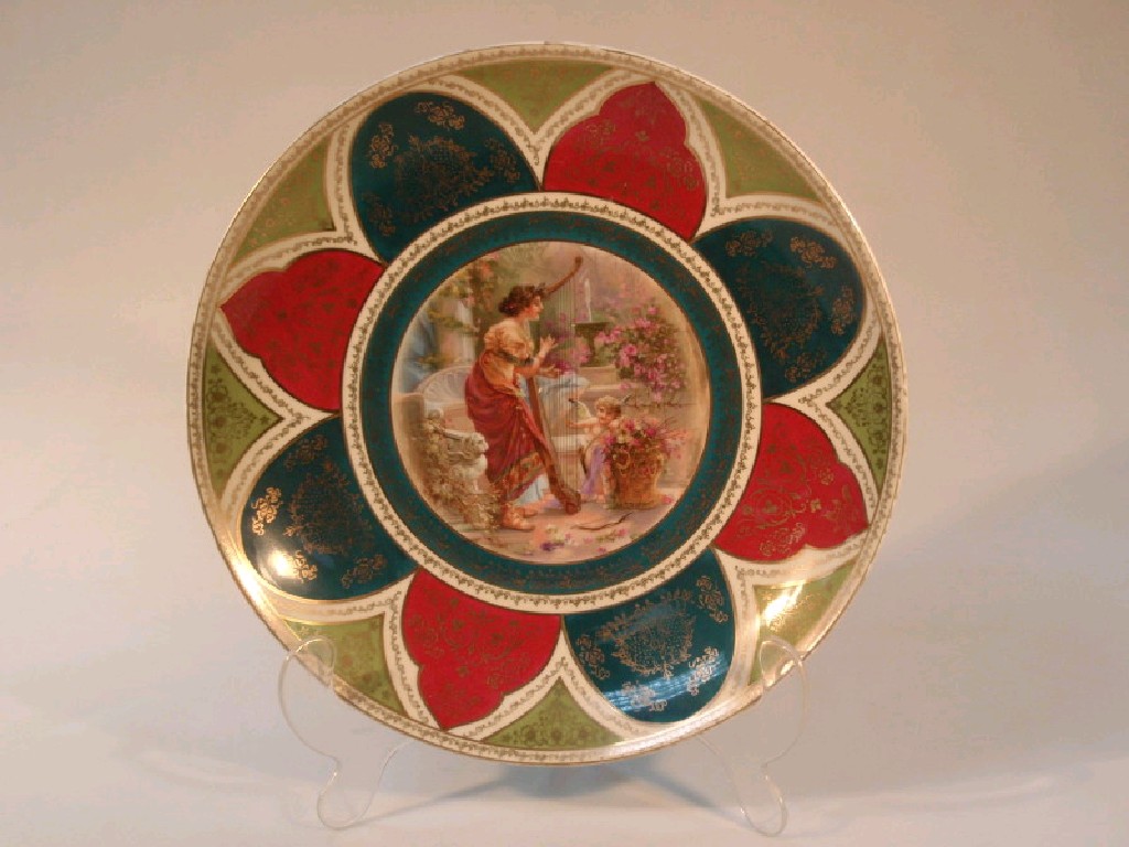 Appraisal: An early thC porcelain 'Vienna' plate polychrome printed with Kaufmann