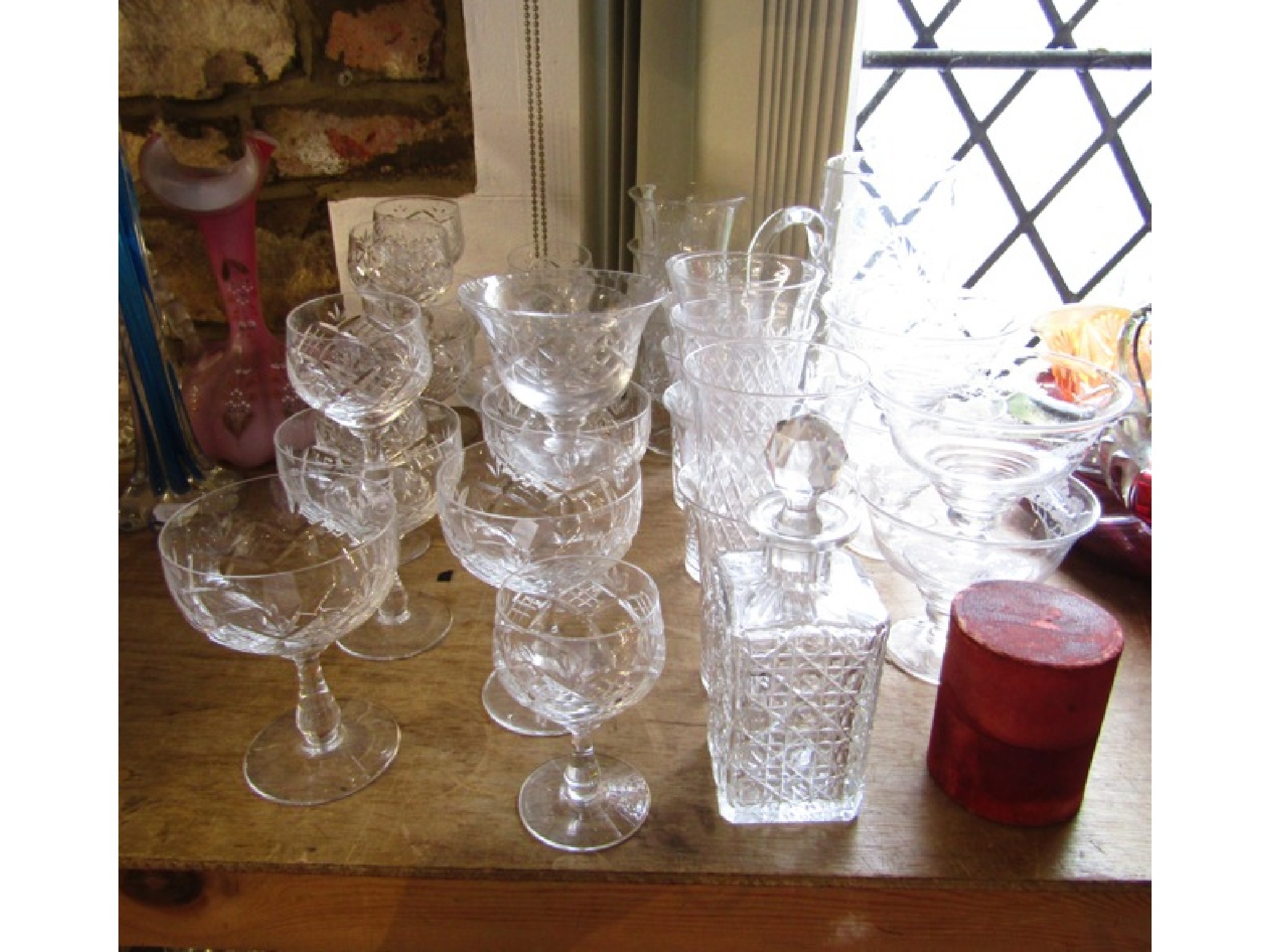 Appraisal: A mixed quantity of clear cut drinking glasses to include