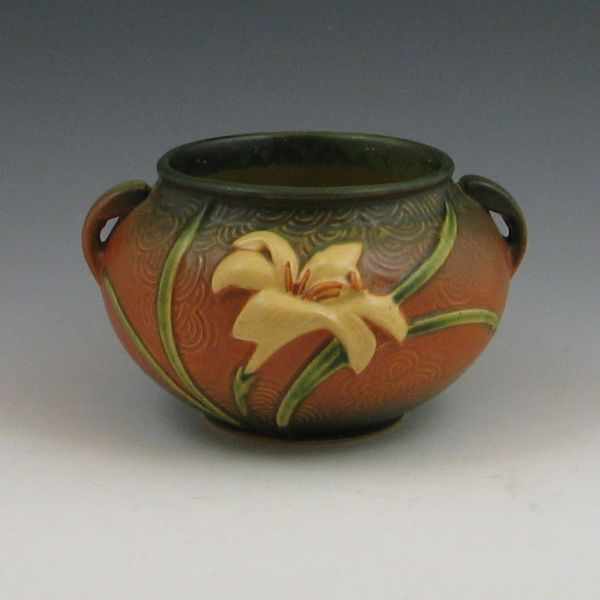 Appraisal: Roseville Zephyr Lily jardiniere in brown and green Marked Roseville