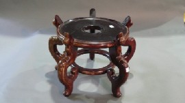 Appraisal: A carved hardwood stand