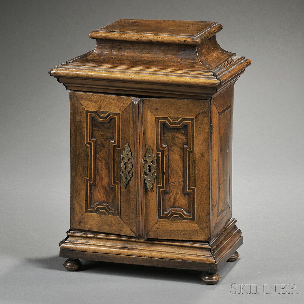 Appraisal: Baroque-style Walnut-veneered Diminutive Cupboard possibly Germany th century and later