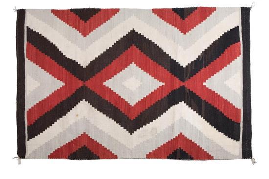 Appraisal: NAVAJO REGIONAL TEXTILE Twentieth century Serrated diamond design in white