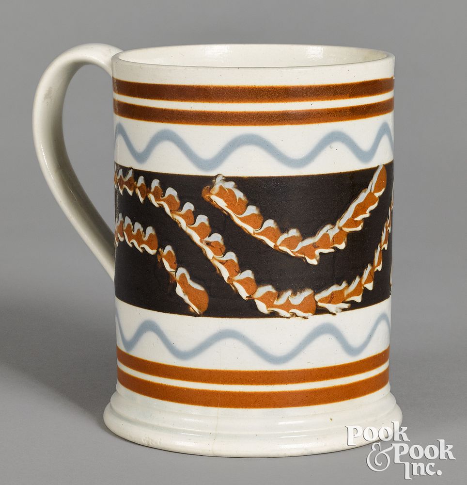 Appraisal: Mocha mug with earthworm decoration Mocha mug with earthworm decoration