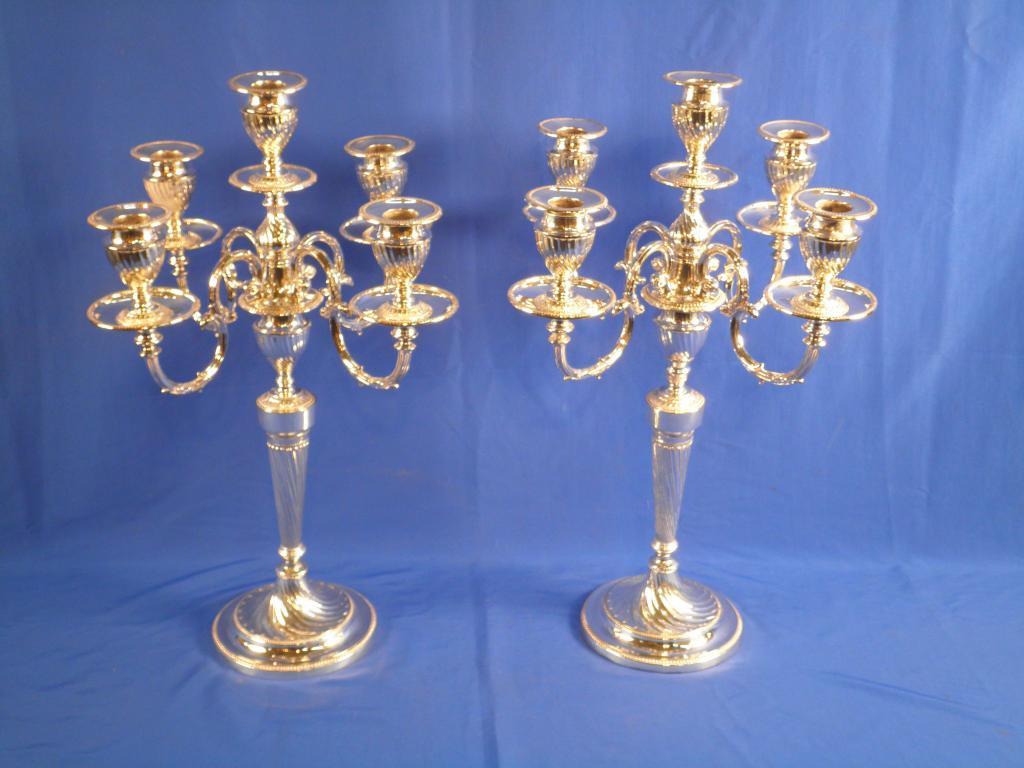 Appraisal: A pair of Edwardian silver plated five branch candelabra each