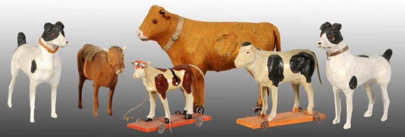 Appraisal: Lot of Early Paper Mache Animals Description Includes cow on