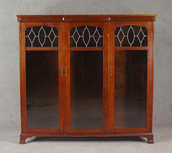 Appraisal: Leaded Glass Oak Bookcase Early th Century Three sections with