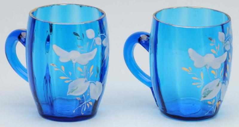 Appraisal: Pair of Moser Blue Glass Cups Description With handles and