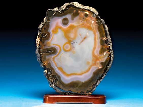 Appraisal: A LARGE TRANSLUCENT AGATE SLICE Brazil A very large translucent