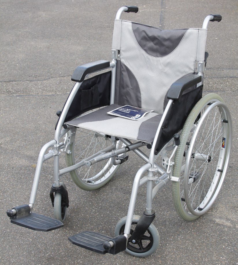 Appraisal: An Enigma Drive folding wheelchair cm high